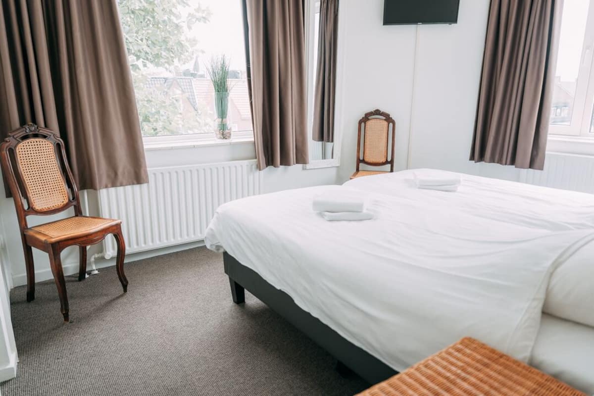 Standaard tweepersoonskamer, gedeelde badkamer | Beddengoed