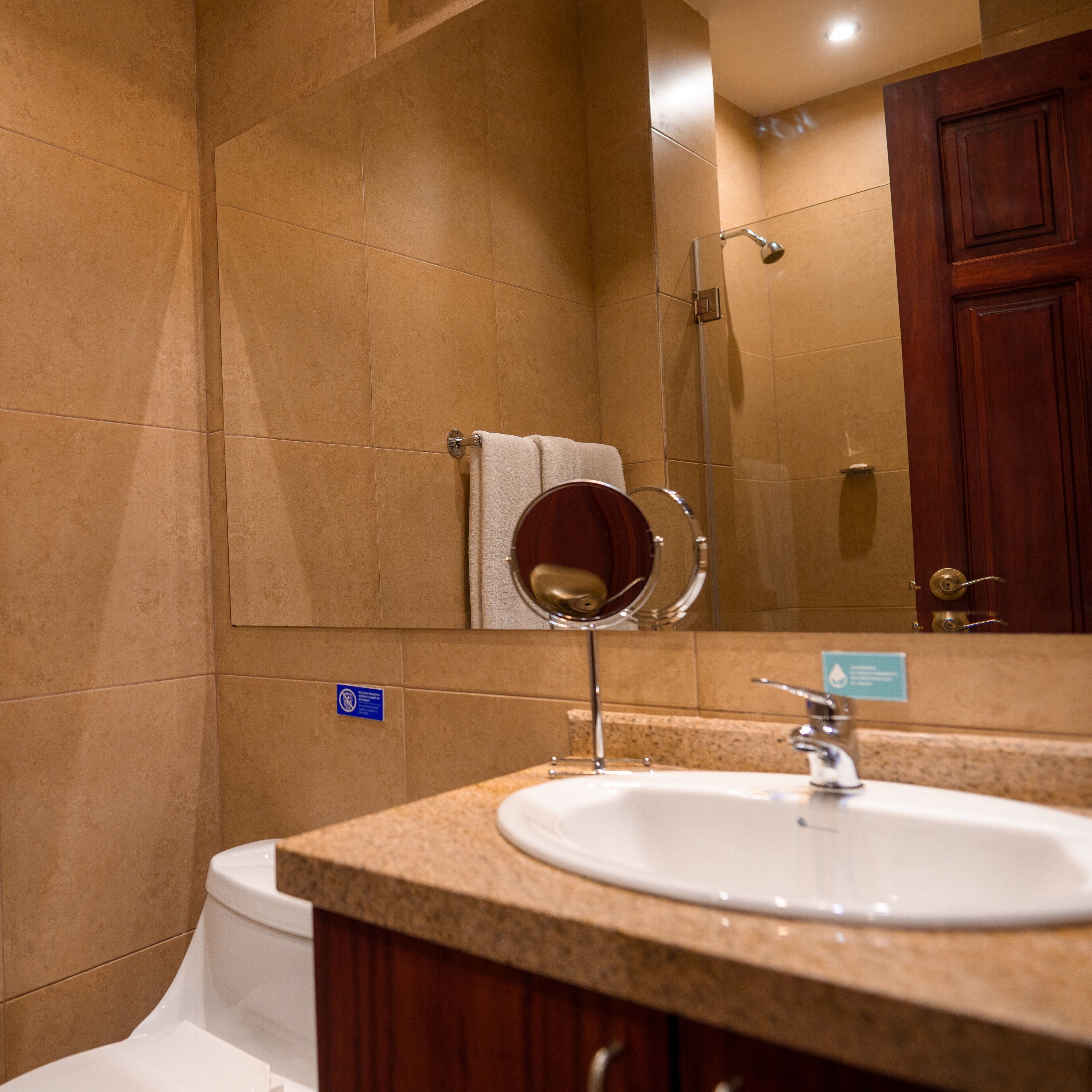 economy double room | bathroom | shower, free toiletries, hair dryer, towels