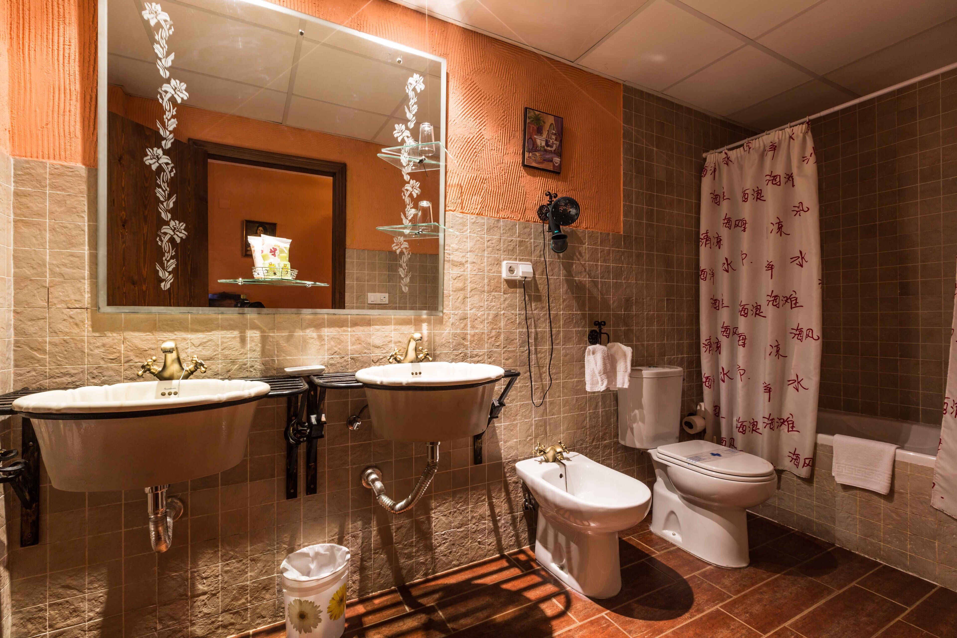 free toiletries, hair dryer, bidet, towels