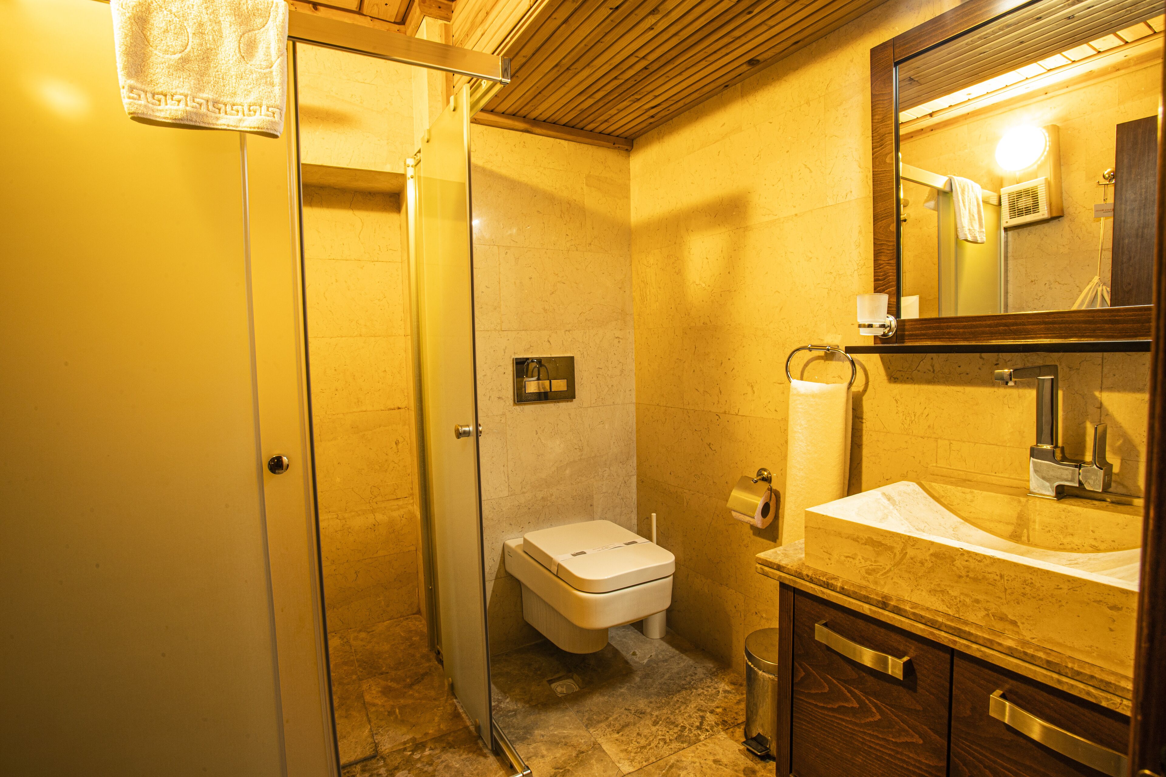 free toiletries, hair dryer, slippers, bidet