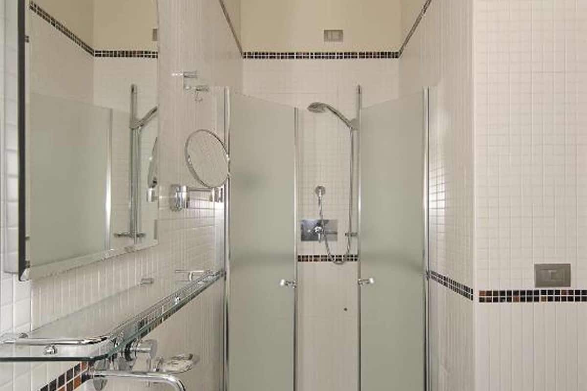 shower, hair dryer, slippers, bidet