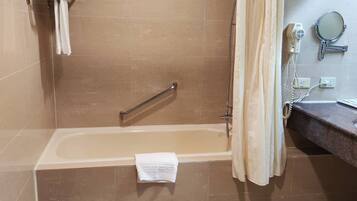 Deluxe Single Room, 1 Double Bed | Bathroom | Combined shower/bathtub, hair dryer, slippers, towels