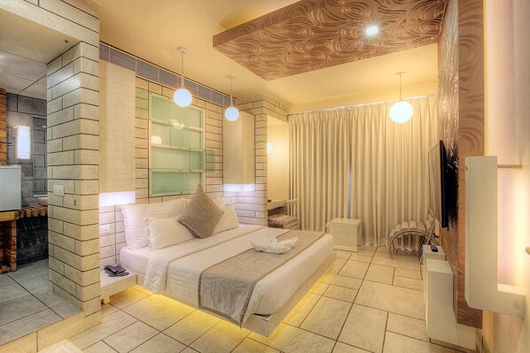 Premium bedding, down comforters, in-room safe, individually decorated - Hotel El Dorado (Ahmedabad)