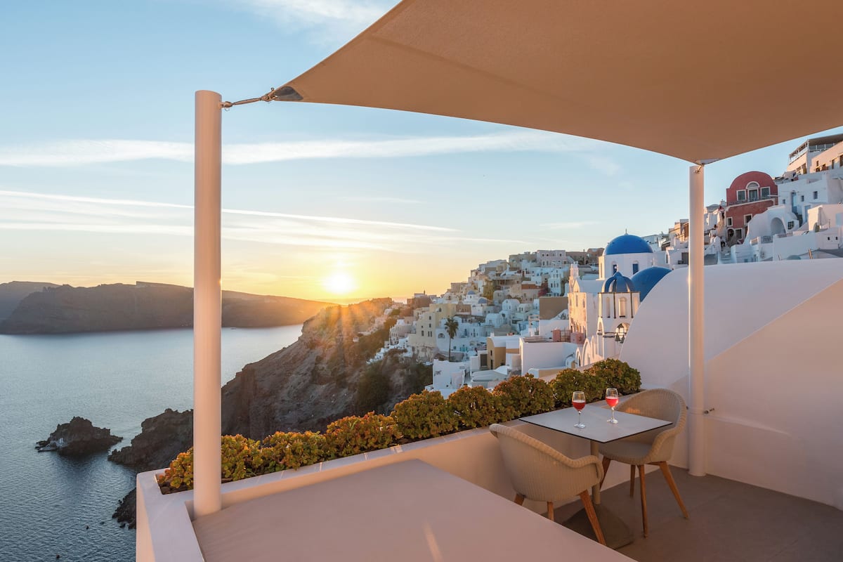 Honeymoon suite, bubbelbad, uitzicht op zee (Petite Honeymoon Suite) | Luxe beddengoed, een minibar met enkele gratis items