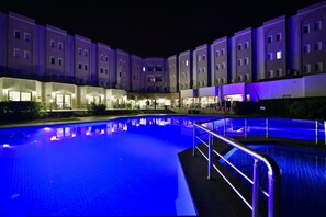 Indoor pool, outdoor pool, pool umbrellas, pool loungers