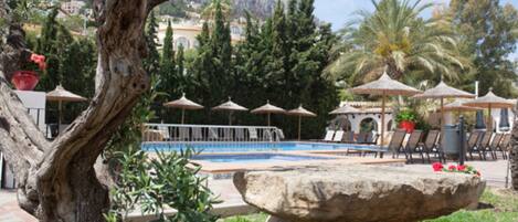 Outdoor pool, pool umbrellas, pool loungers