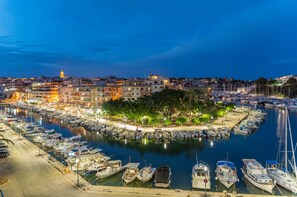 Stunning waterfront views of the marina and surrounding promenade.