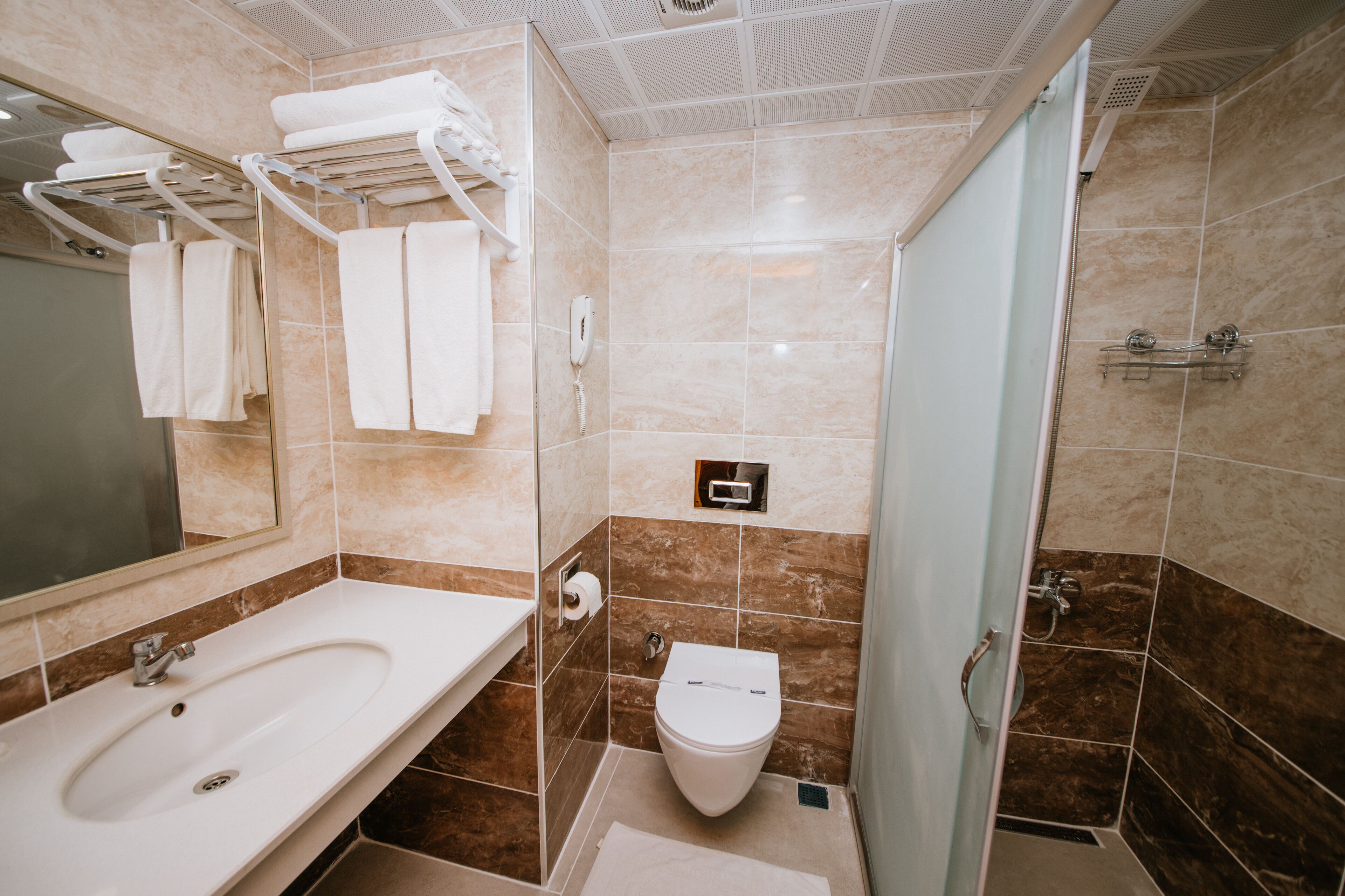 bathtub, free toiletries, hair dryer, slippers