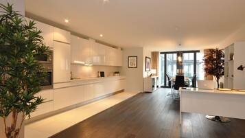 Apartment, 2 Bedrooms | Private kitchen | Fridge, microwave, stovetop, dishwasher