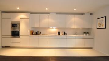 Apartment, 2 Bedrooms | Private kitchen | Fridge, microwave, stovetop, dishwasher