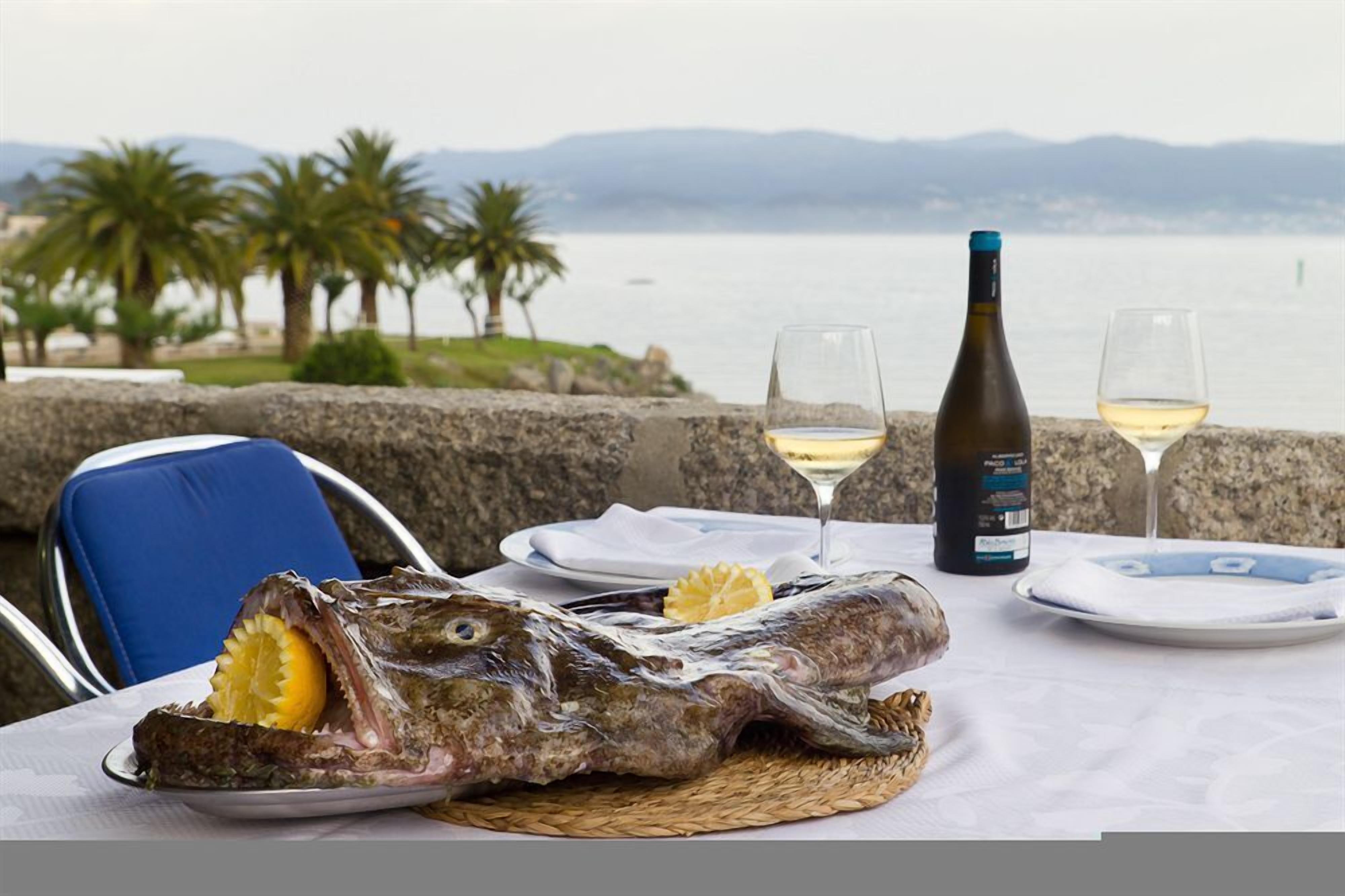 breakfast, lunch, dinner served; spanish cuisine, beach views
