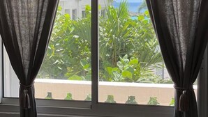 Palm Court 27 | Oppholdsområde | Flatskjerm-TV