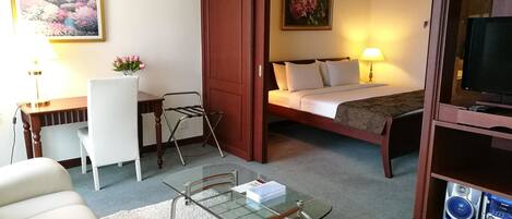 Standard Suite | Living area | 53-inch LCD TV with satellite channels, TV