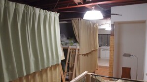 A room with a wooden ladder, a white sink, and a door. - SAKURA GUEST HOUSE OSAKA DOUTONBORI - Hostel (Osaka)