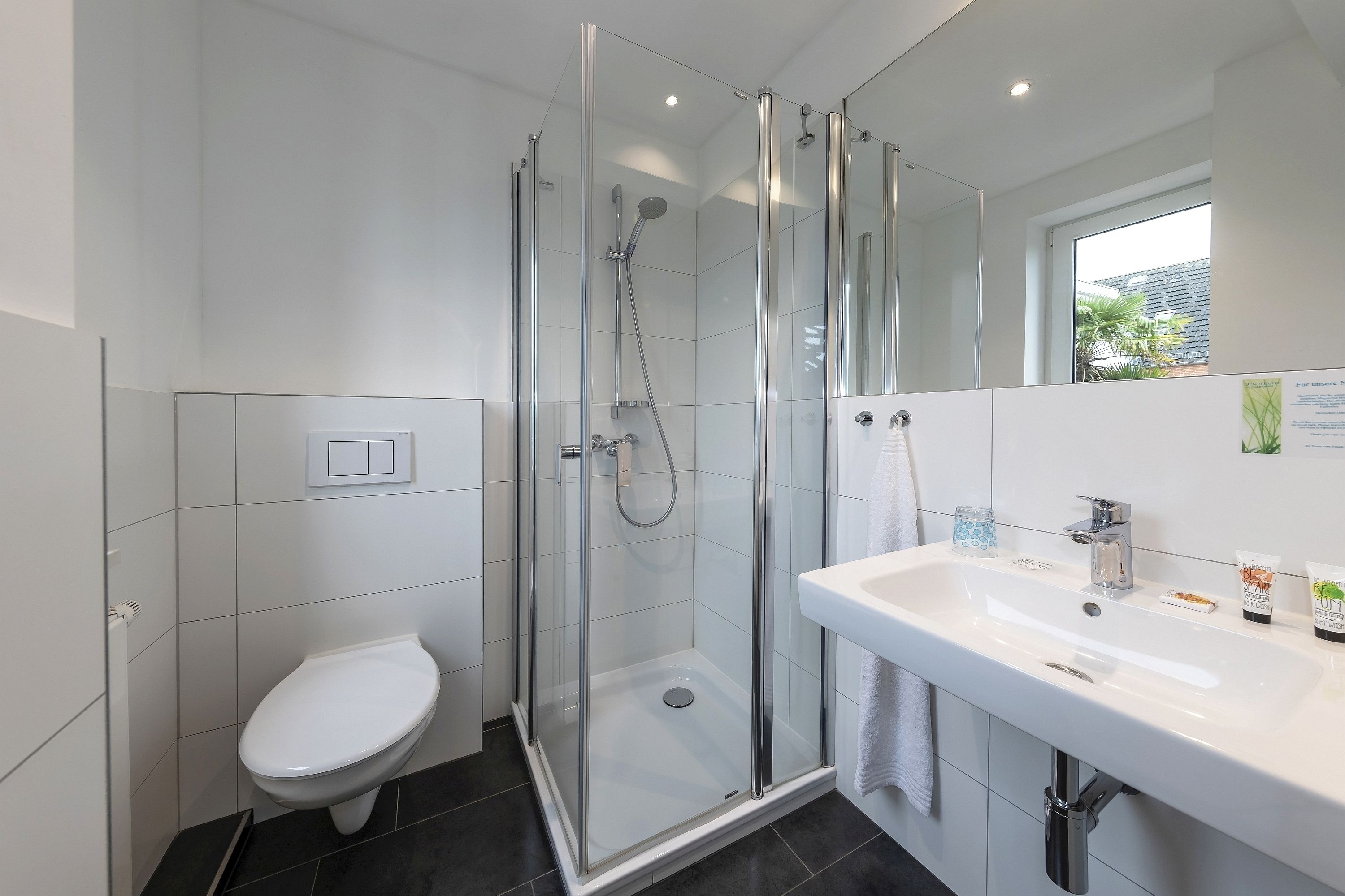 shower, free toiletries, hair dryer, towels