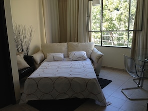 Superior Apartment, 1 Bedroom | Living room | Flat-screen TV, first-run movies