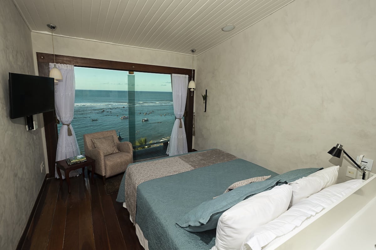 Suíte superior | 1 camera, minibar, una cassaforte in camera, tende oscuranti