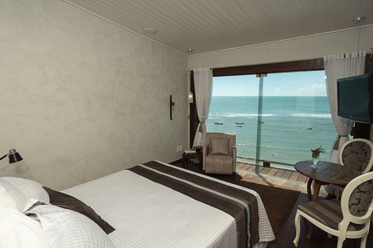 Suíte Queen vista mar | 1 camera, minibar, una cassaforte in camera, tende oscuranti