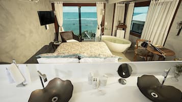 Suite Confort | 1 dormitorio, minibar, caja fuerte y cortinas opacas