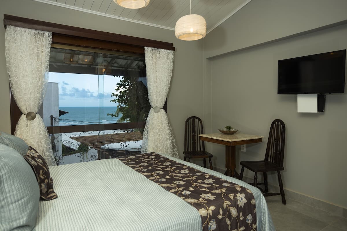 Suite Design, edificio separato | 1 camera, minibar, una cassaforte in camera, tende oscuranti
