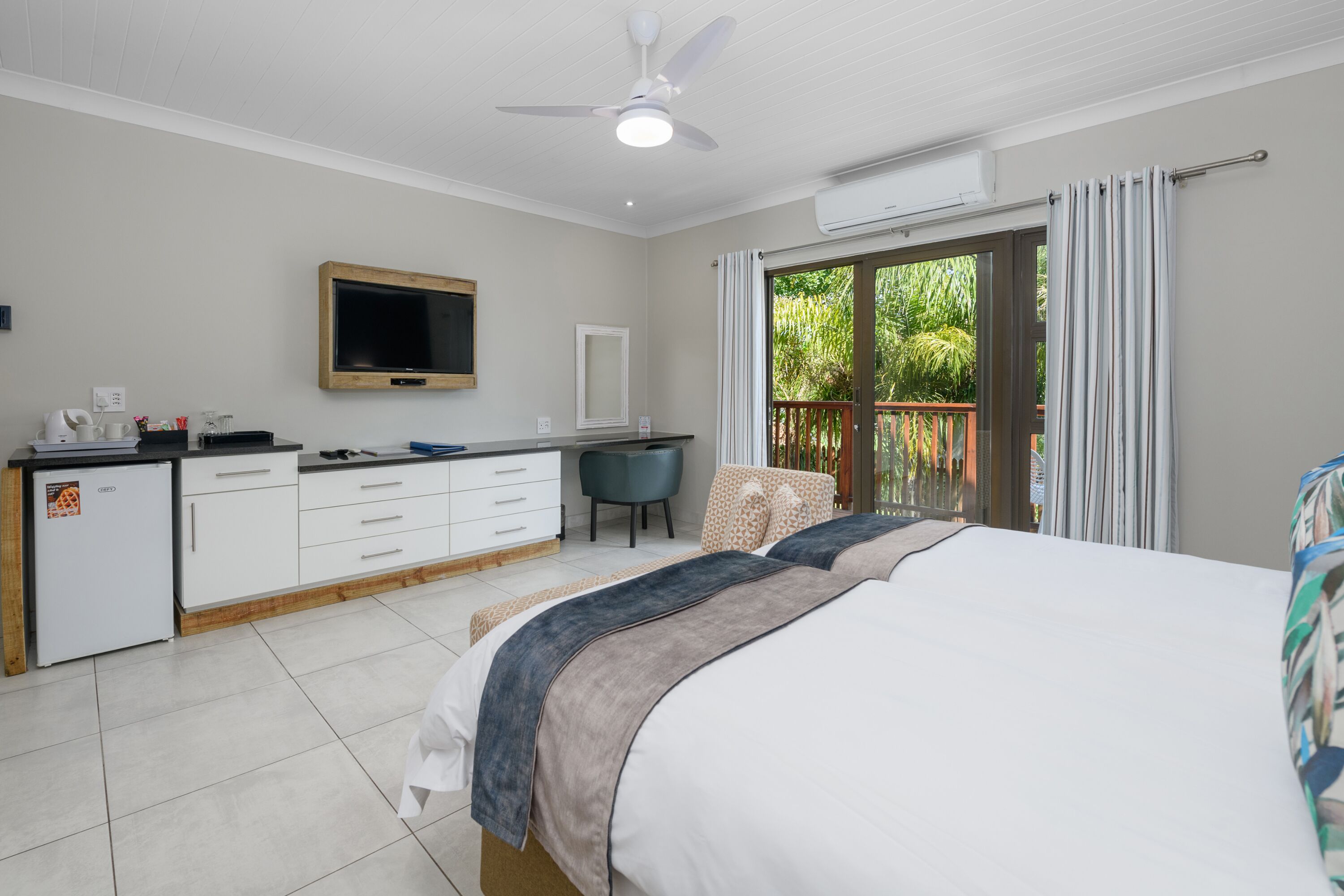 twin room with patio | in-room safe, free wifi, bed sheets