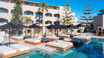 Seasonal outdoor pool, pool umbrellas, pool loungers