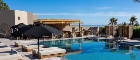 Seasonal outdoor pool, pool umbrellas, sun loungers