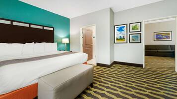 Premium bedding, desk, laptop workspace, blackout curtains