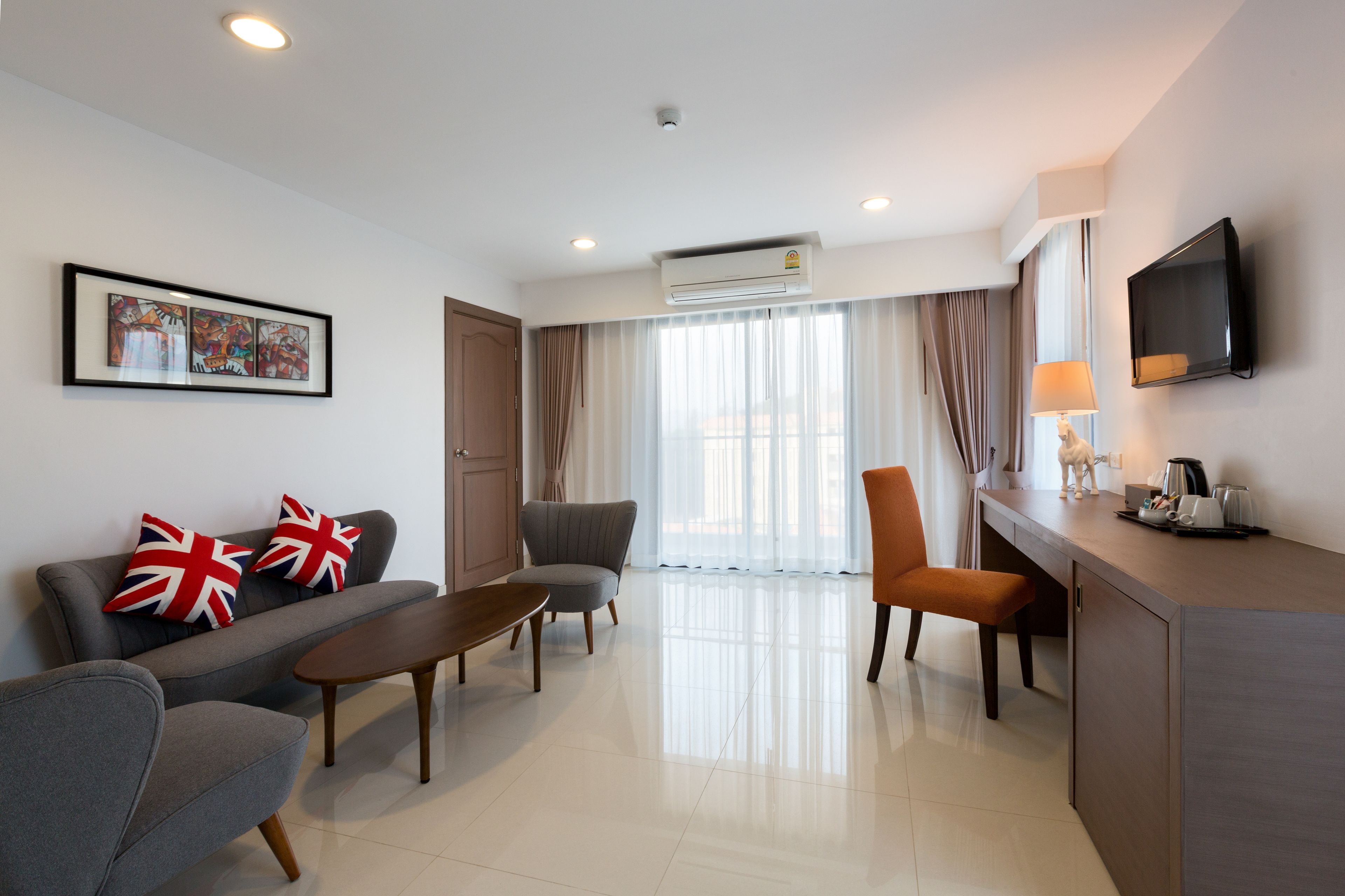 jacuzzi suite | living room | 32-inch lcd tv with satellite channels, tv