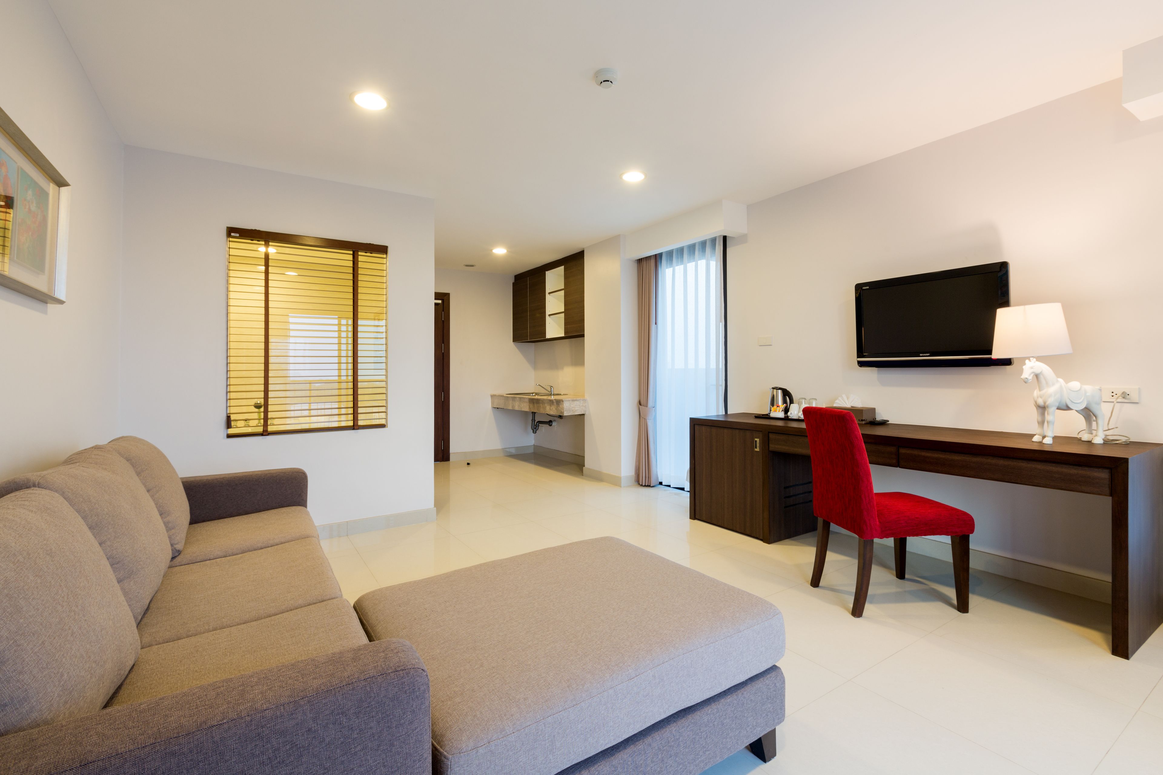jacuzzi suite | living room | 32-inch lcd tv with satellite channels, tv