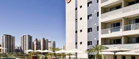 Outdoor pool, open 8 AM to 11 PM, sun loungers