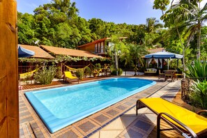 Outdoor pool, pool umbrellas, pool loungers