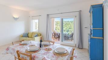 Apartment, 2 Bedrooms, Sea View | Living area | Flat-screen TV