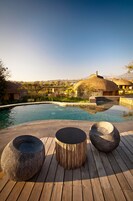 Outdoor pool, pool umbrellas, sun loungers