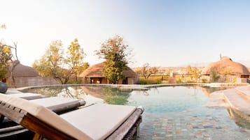 Outdoor pool, pool umbrellas, pool loungers