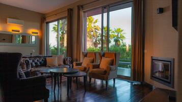 Villa, 3 Bedrooms, Garden View | Living area | 0-inch flat-screen TV with cable channels, TV