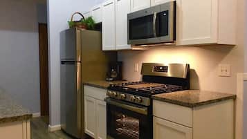 Family Chalet | Private kitchen | Fridge, microwave, stovetop, coffee/tea maker