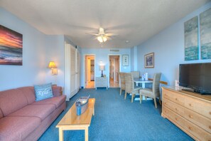 Condo, 1 Bedroom, Balcony, Ocean View | Living room | Flat-screen TV - The Dunes Towers by Palmetto Vacations (Myrtle Beach)