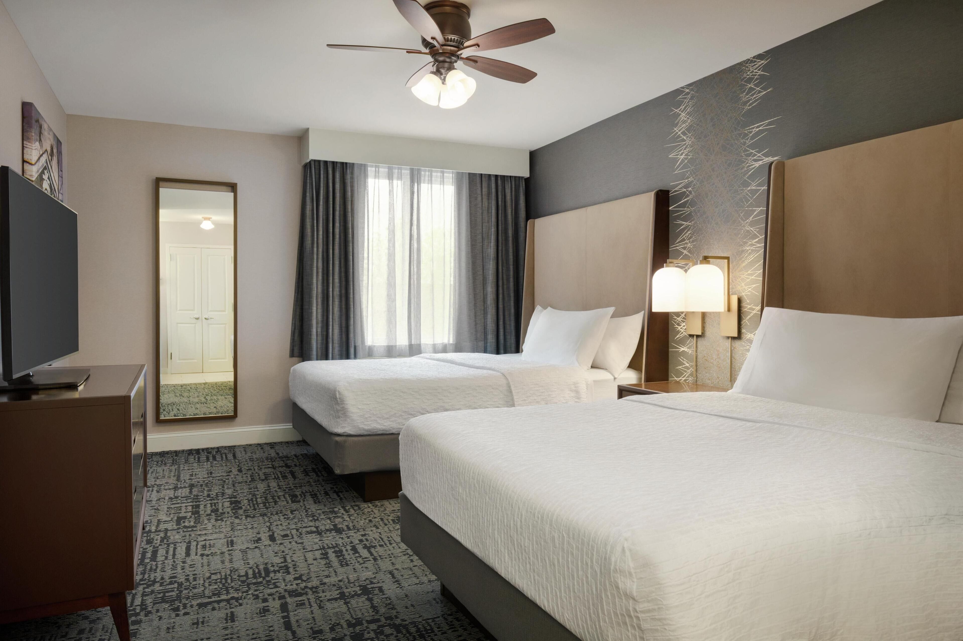 premium bedding, desk, blackout curtains, iron/ironing board