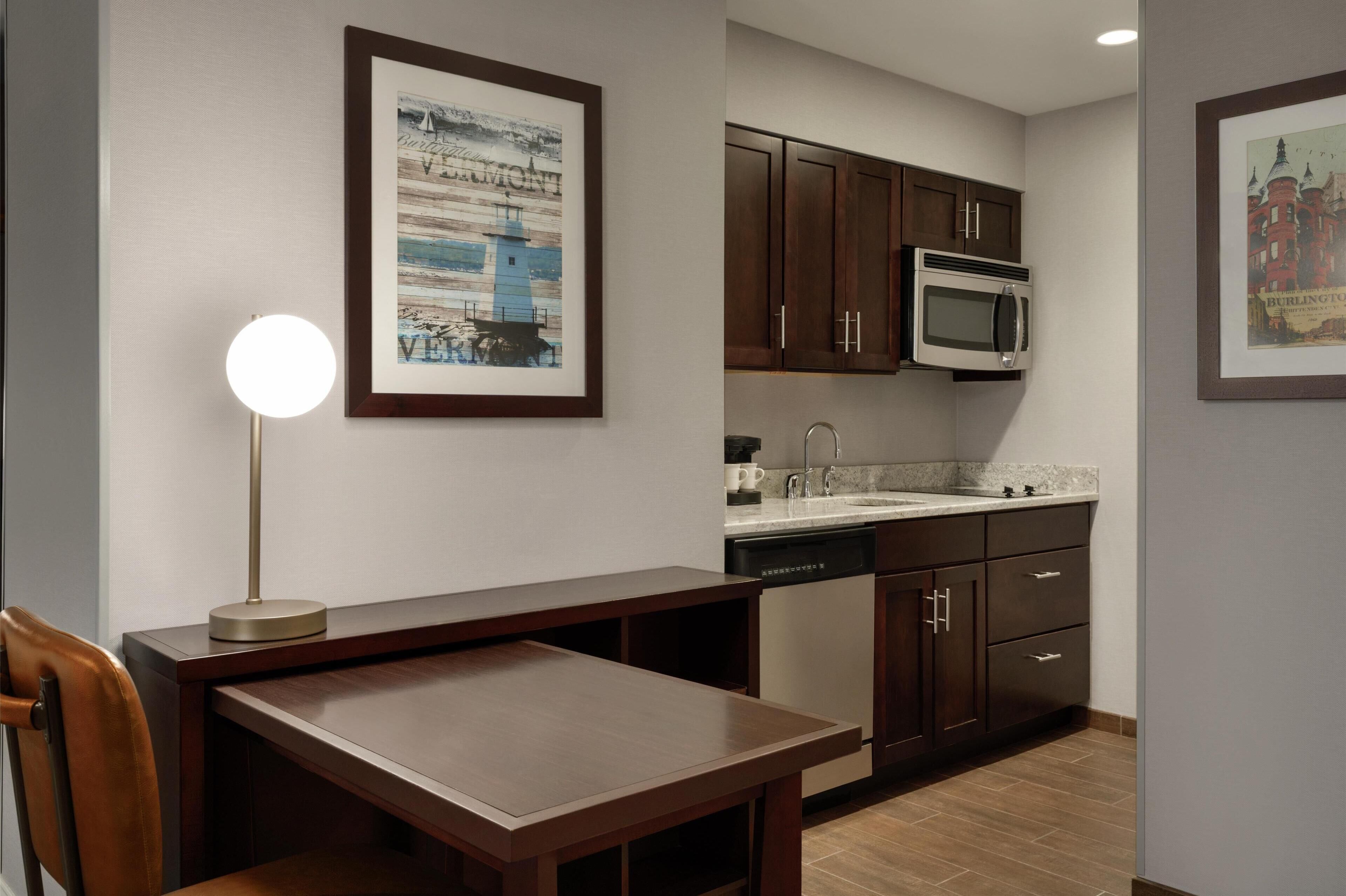 full-sized fridge, microwave, dishwasher, coffee/tea maker