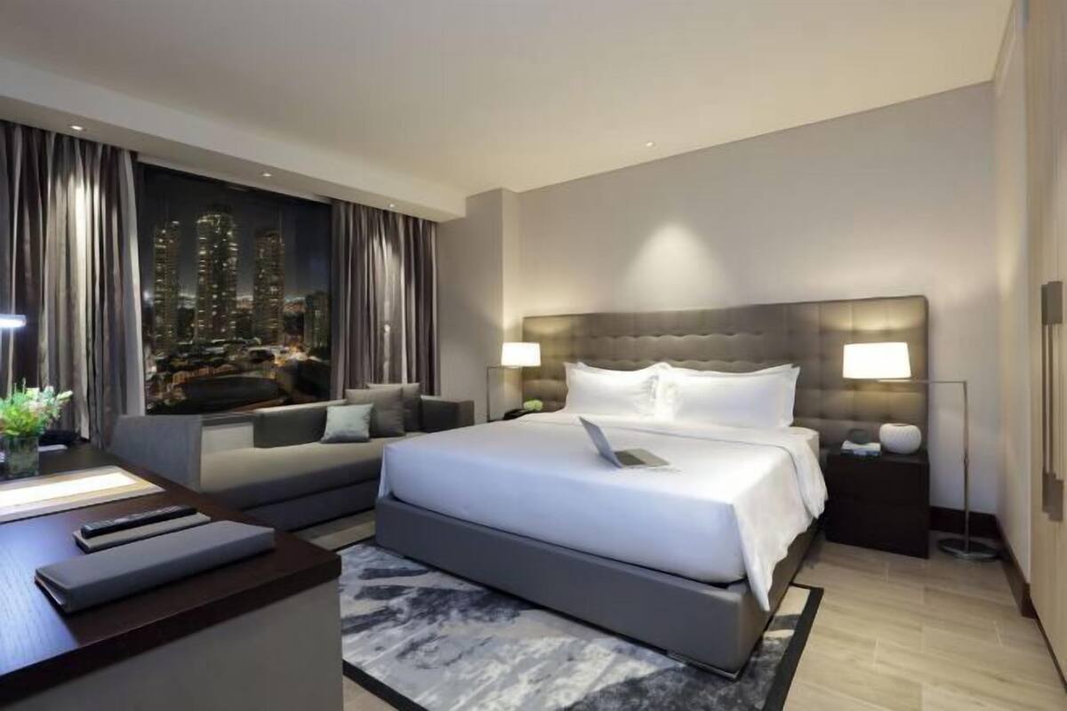 Premium bedding, down duvets, in-room safe, desk