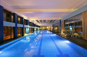 Indoor pool, open 8:00 AM to 7:00 PM, sun loungers, lifeguards on site