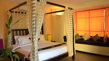 Deluxe Double Room, Pool View | Minibar, in-room safe, desk, free WiFi