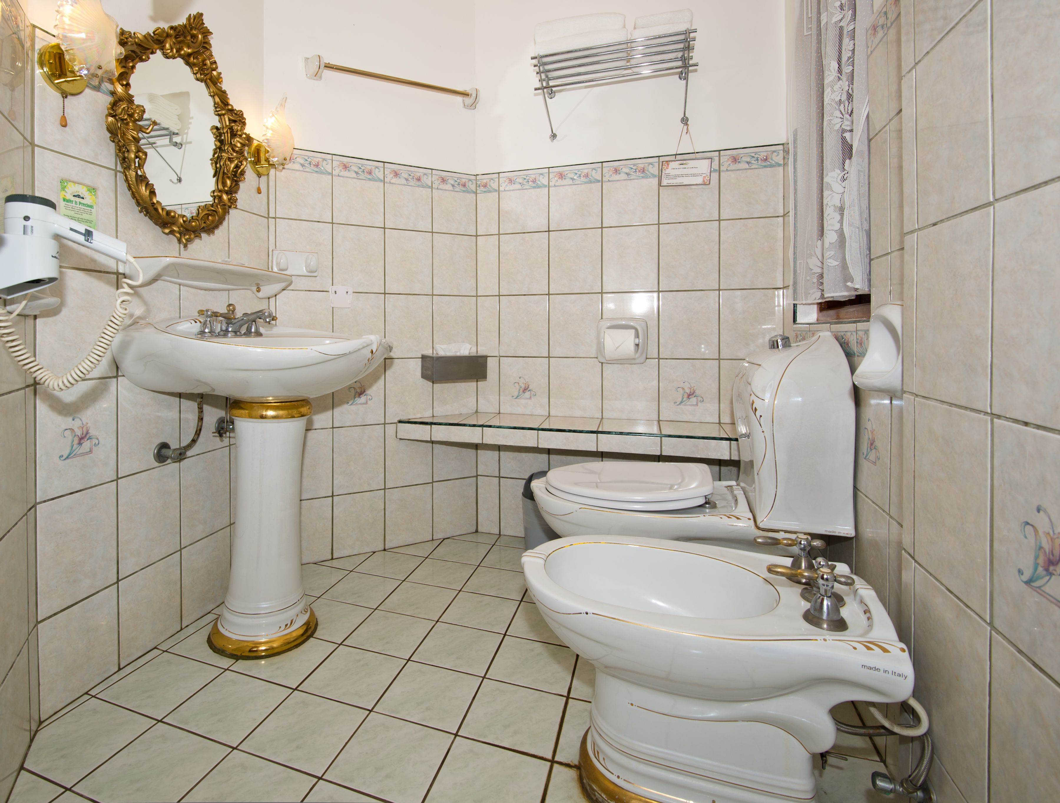 villa suite | bathroom | shower, free toiletries, hair dryer, towels