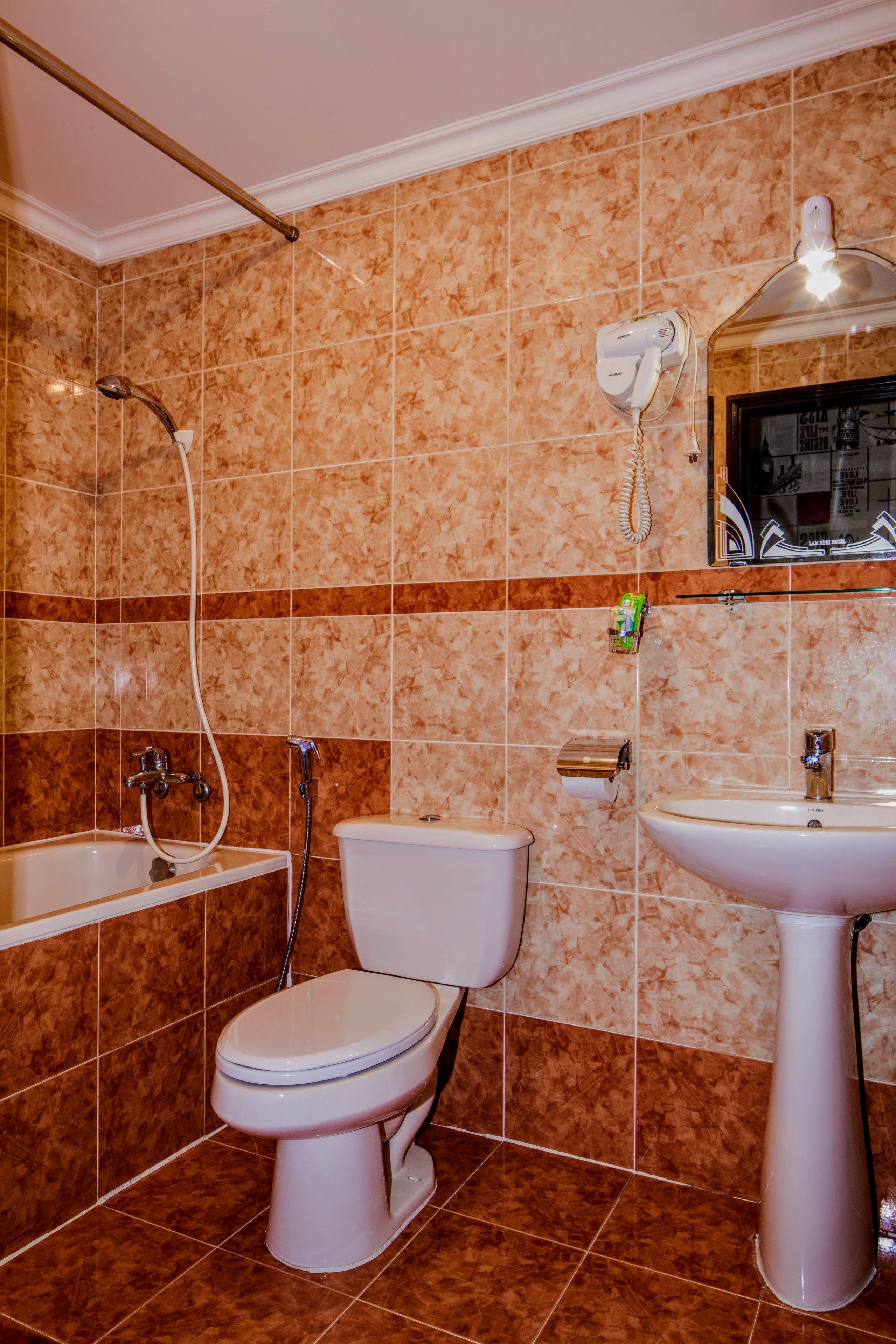 deep-soaking bathtub, free toiletries, hair dryer, slippers