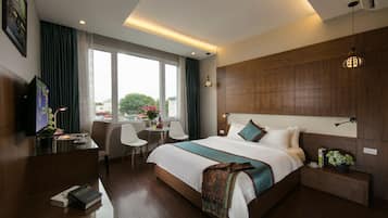 Deluxe Room, City View | Premium bedding, minibar, in-room safe, desk