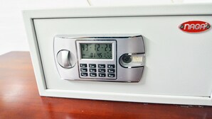 A secure safe with a digital keypad and a lock mechanism. - Lamenda Saigon Hotel (Ho Chi Minh City)