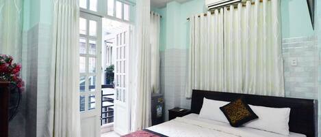 Habitación Deluxe con 1 cama doble o 2 individuales | Caja fuerte y wifi gratis