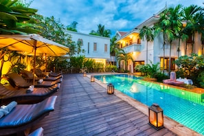 Outdoor pool, pool umbrellas, sun loungers