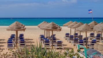 Beach nearby, white sand, free beach shuttle, sun loungers